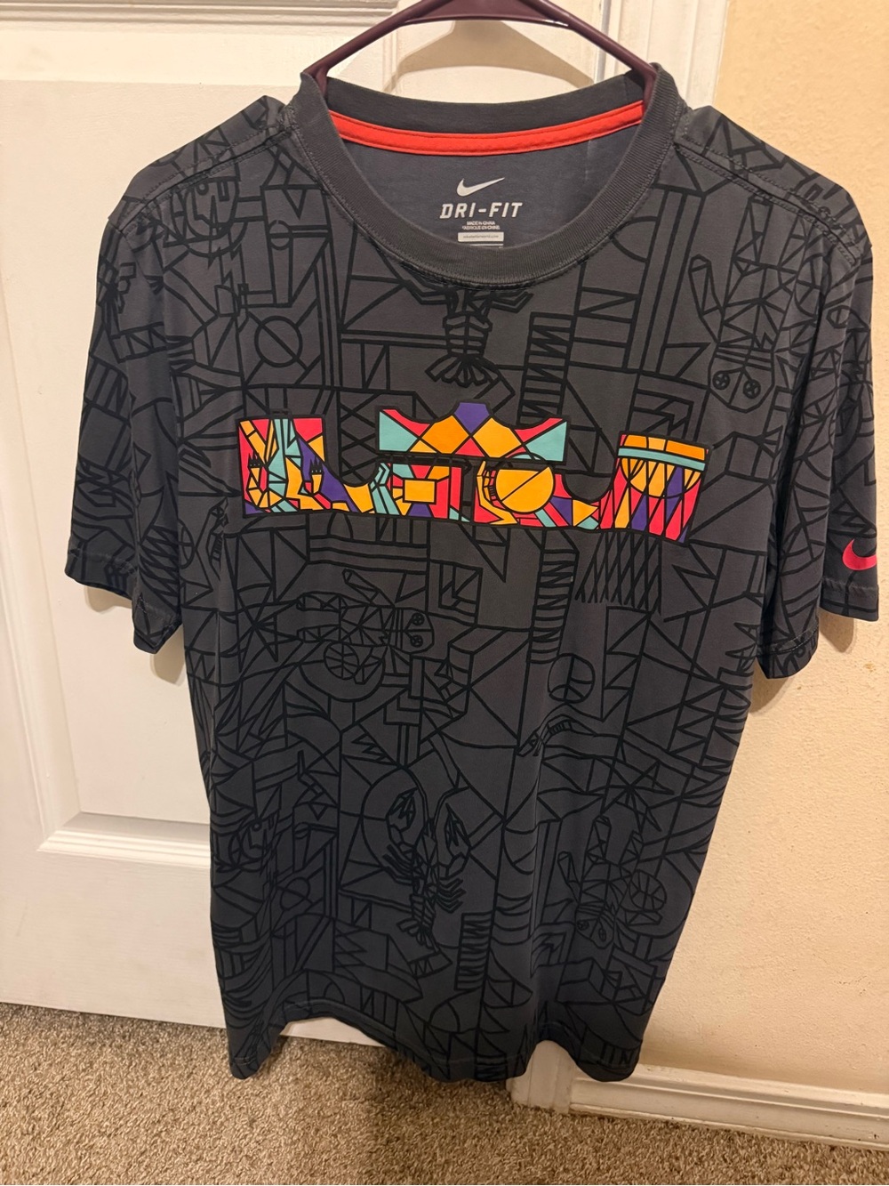 Nike Black Dri-FIT Short-Sleeve Tee with Multicolor Geometric Logo